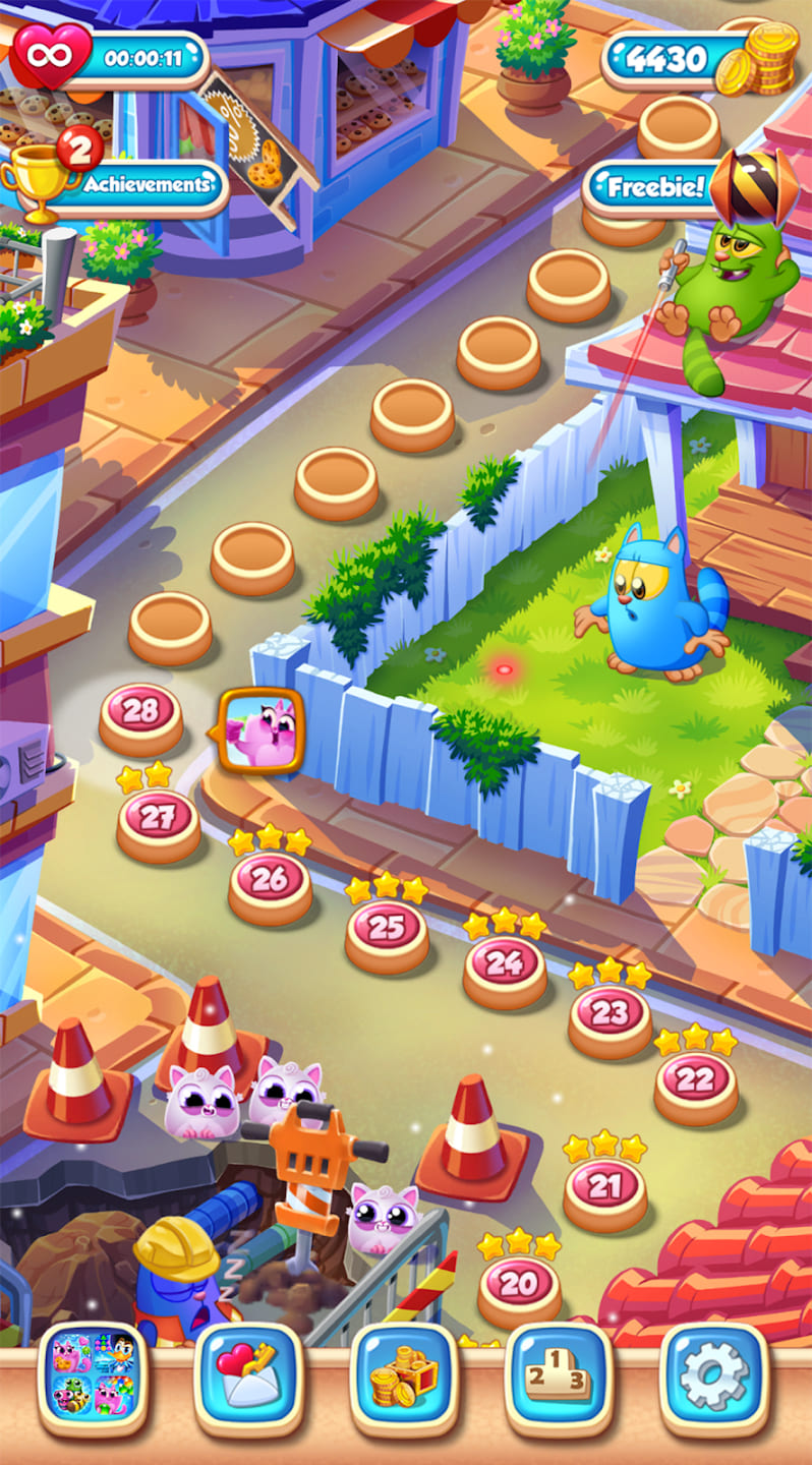 Mapa poziomów Cookie Cats Blast z drogą i postaciami